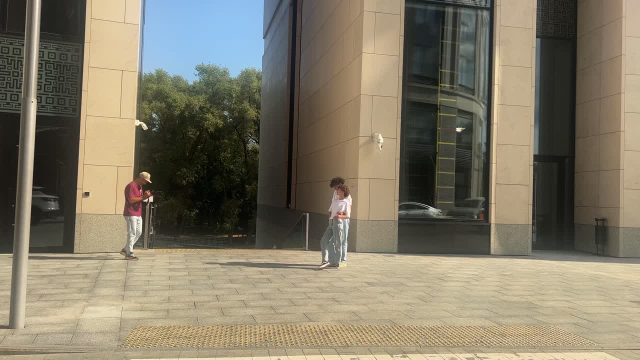 People in an urban environment near buildings