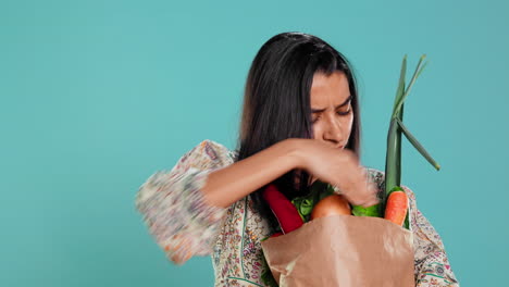 Upset-woman-frowning-after-forgetting-to-buy-some-groceries