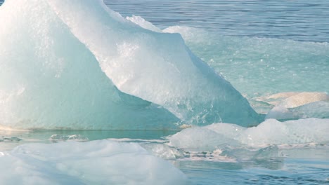 melting ice floes drifting in strong sea currents of arctic ocean