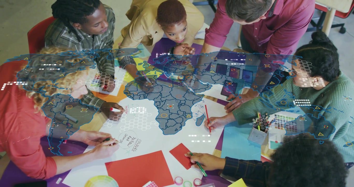 Design team spreading color sheets, swatches activating map overlay flickering nodes for planning