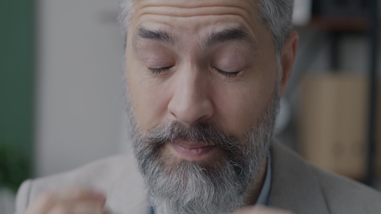 Stressed Middle-Aged Man Experiencing Pain