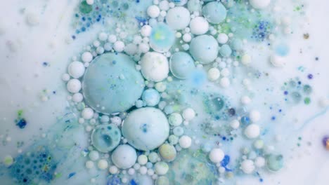 abstract fluid art with blue and white bubbles