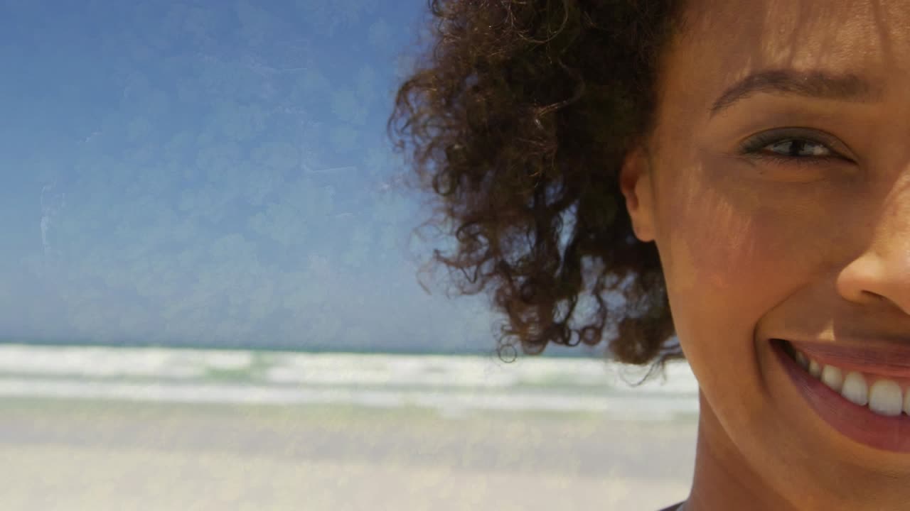 Animation of tree over african american woman smiling