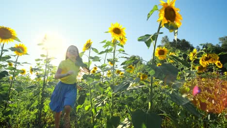 a happy child running among sunflowers
