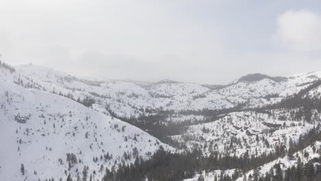 Snowy-mountain-dolly-down-shot-4k-aerial-in-Lake-Tahoe