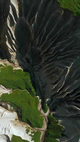 aerial view of a canyon with lush vegetation