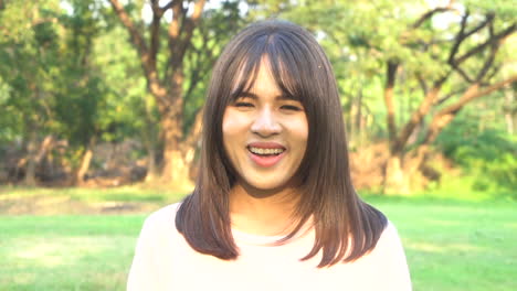 Slow-motion-portrait-of-happy-Asian-woman.