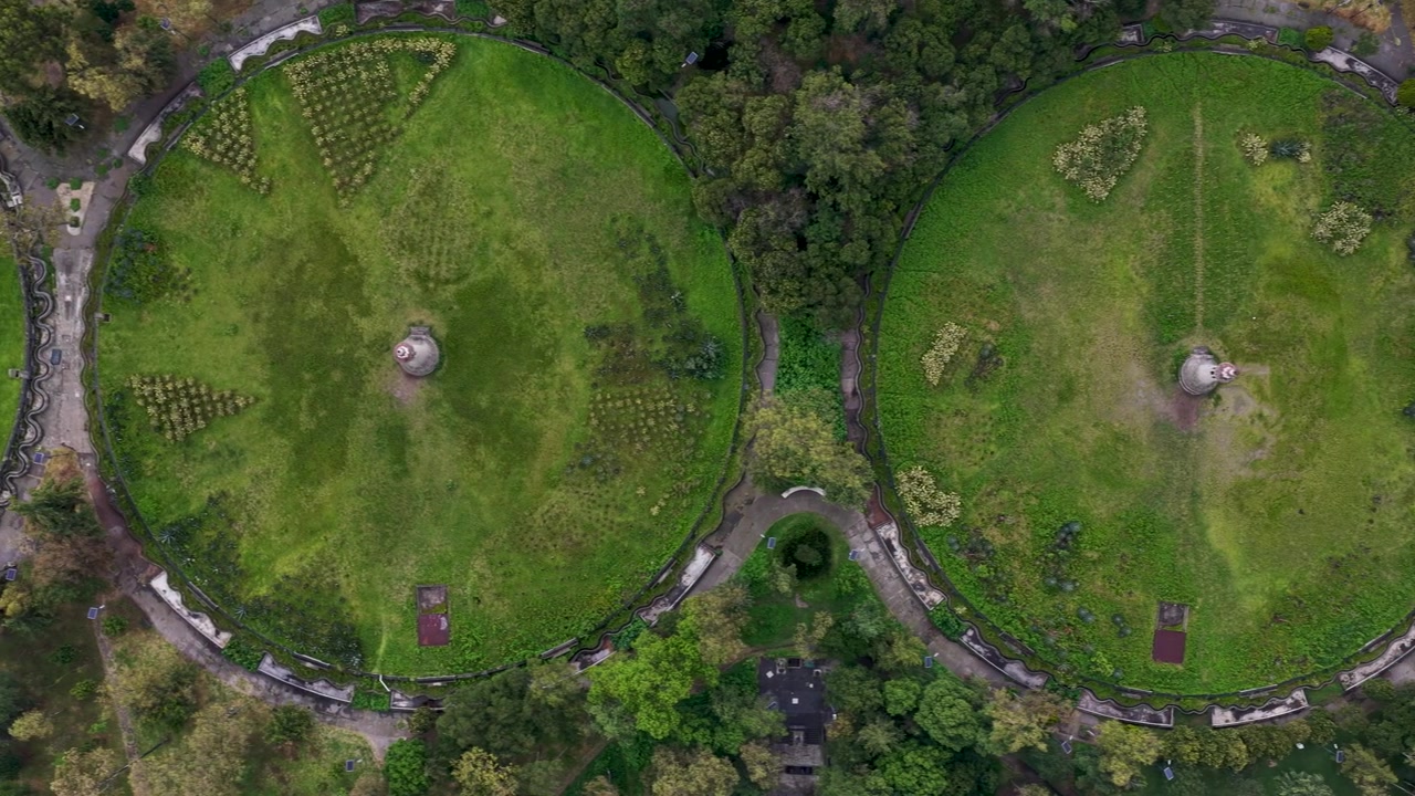 Aerial video of water tanks and diego rivera fountain mural in mexico city
