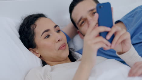 Couple,-phone-and-reading-in-bed