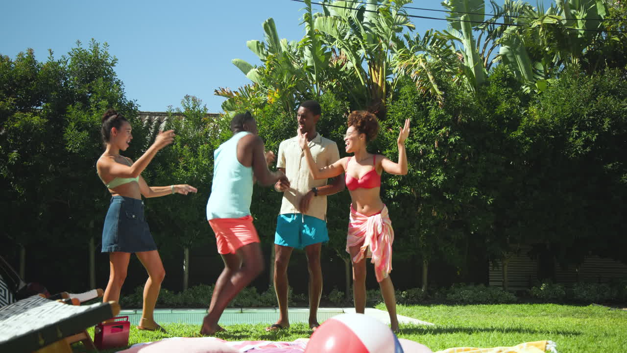 Diverse friends playing by pool, enjoying sunny day with laughter and fun activities