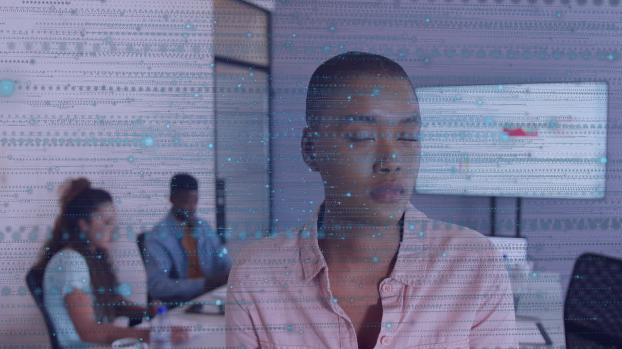 Animation of spots over diverse business people in office