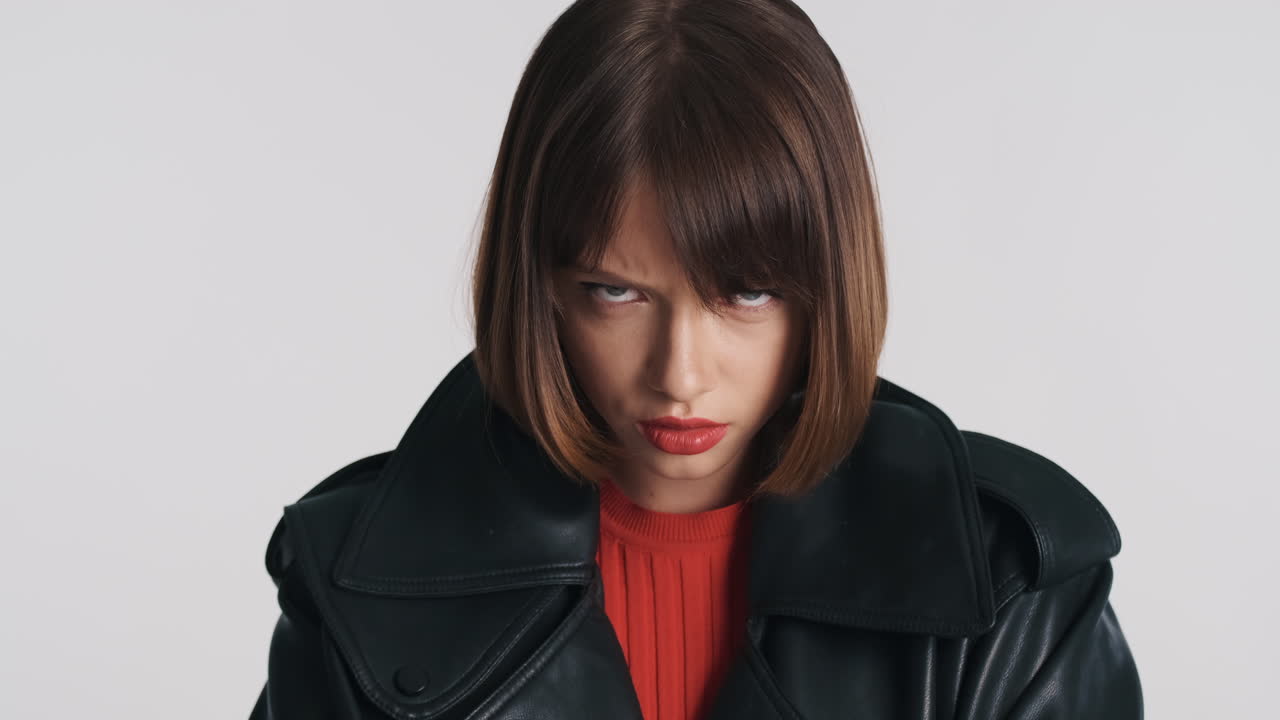 Female model with aggressive look posing