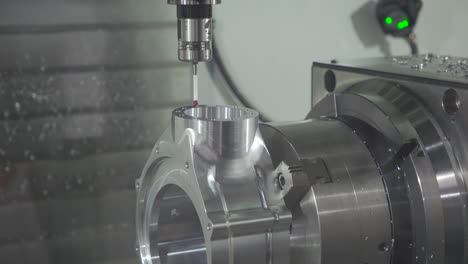 Close-up-realtime-footage-of-precise-machinery-and-automatic-process-to-manufacture-complex-industrial-parts