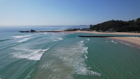 waves splashing on sandy shore in palm beach, gold coast, qld, australia - drone shot