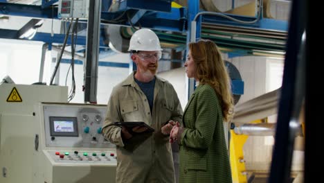 factory workers in discussion