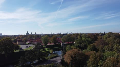 Imposing-Kastellet-Fortress-and-Maritime-Monument-sculpture-on-a-sunny-summer-day-in-Copenhagen,-aerial-view