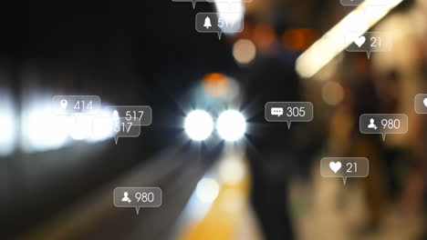 animation of social media icons and numbers over out of focus train in station