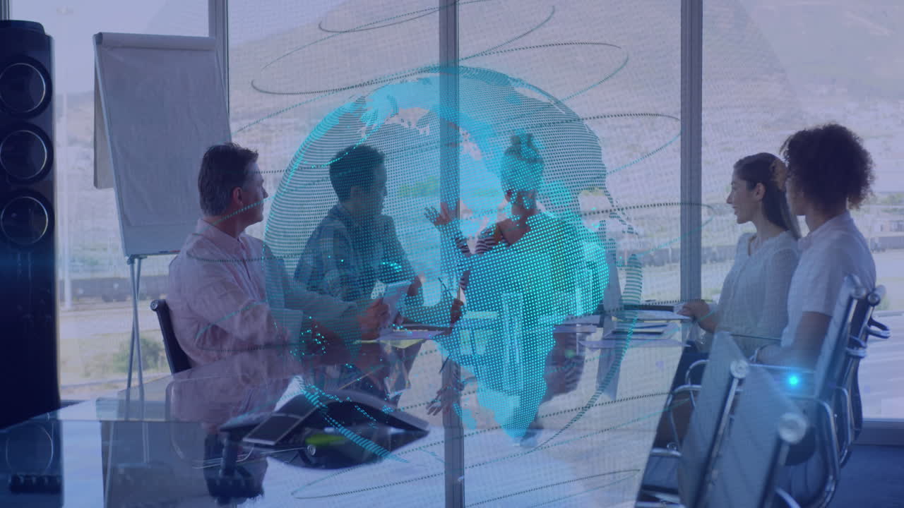 Animation of spinning globe against group of diverse businesspeople discussing together at office