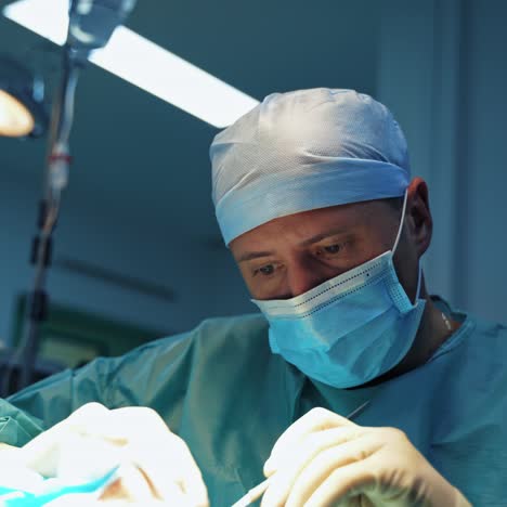 male surgeon operates a patient in the operating room. blepharoplasty plastic surgery operation for modifying the eye region of the face in medical clinic.