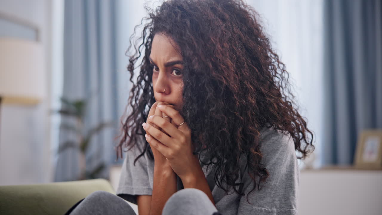 A woman looking troubled