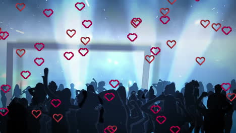 silhouettes dancing on dance floor under glowing spotlights while hearts floating around screen