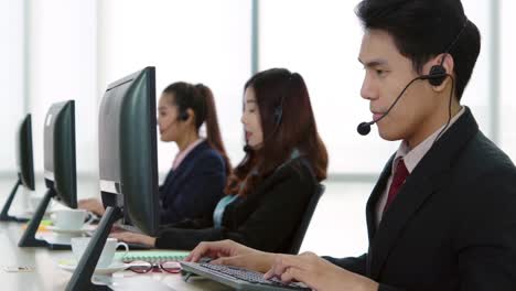 business people wearing headset working in office