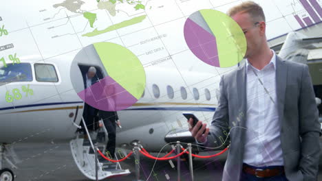 Using smartphone, businessman analyzing data charts with animation on private jet
