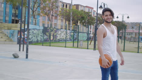 young boy practicing basket ball