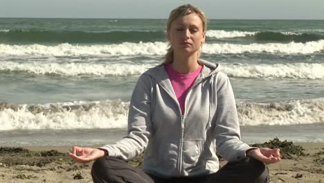 female relaxing on beach