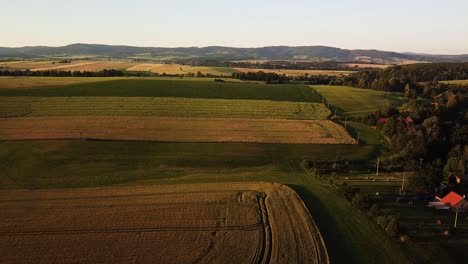 Rising-over-rolling-hills-near-Martinkovice,-Czech-Republic