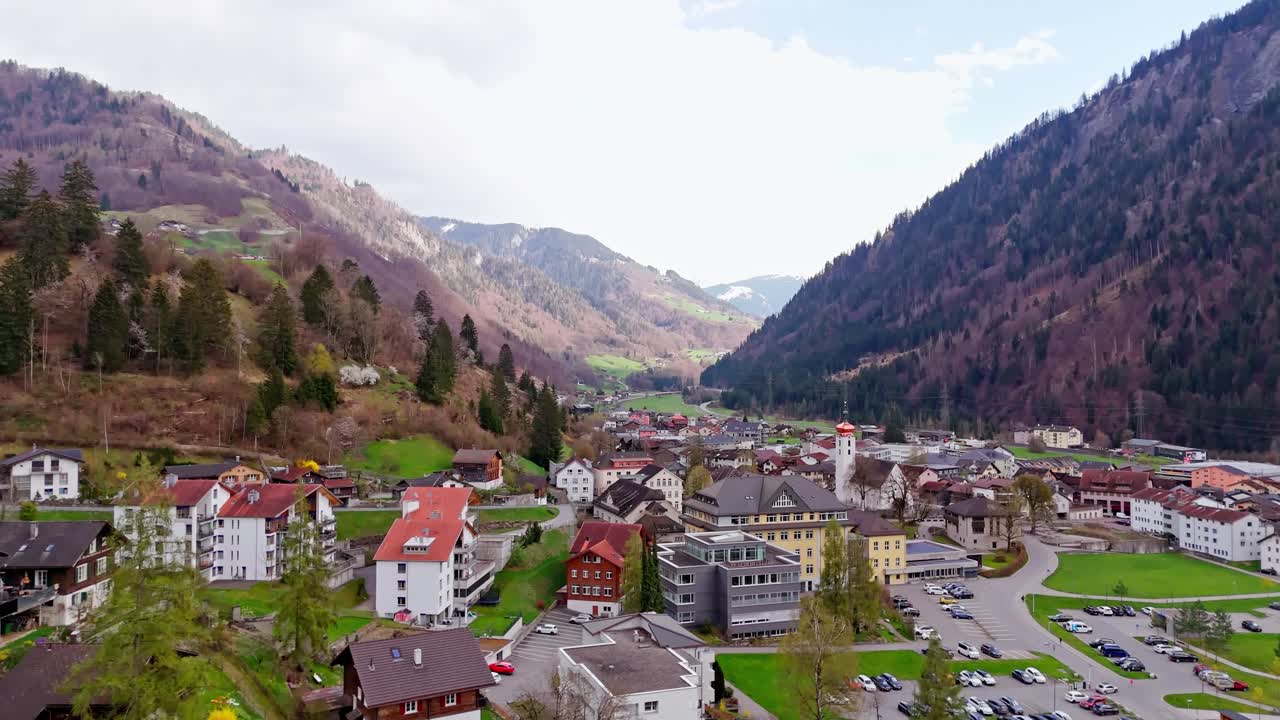 Scenic aerial view of Schiers village, nestled between mountains in Switzerland