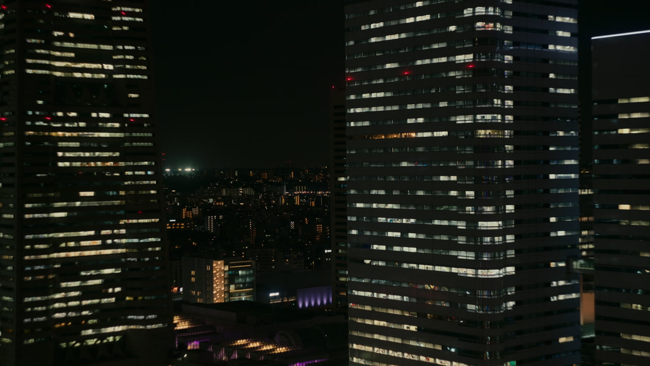 Night view of Yokohama city with bright urban lights and modern architecture