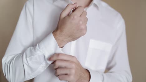 groom getting ready dressed. happy gorgeous handsome groom getting ready dressed in the morning