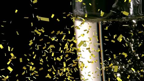 animation of gold confetti falling over champagne pouring into glass on black background