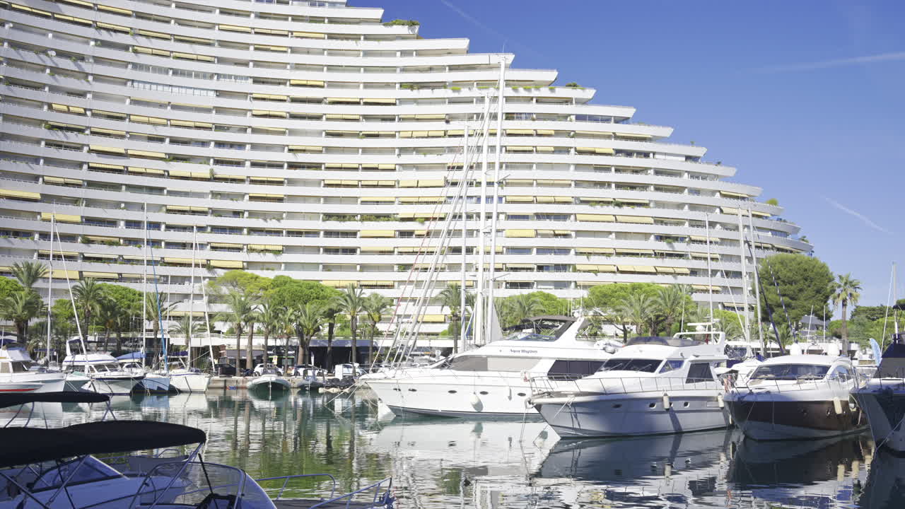 Villeneuve-Loubet, France - June 7, 2025: Boats docked in the Marina Baie des Anges in daylight