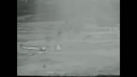 man standing in coat and hat in snow, soviet union archive video of a member of the soviet people during spring flood. circa ussr 1970: an archival video capturing a member of the soviet people wearing a coat and hat, standing in the snow during spring flood in the soviet union.