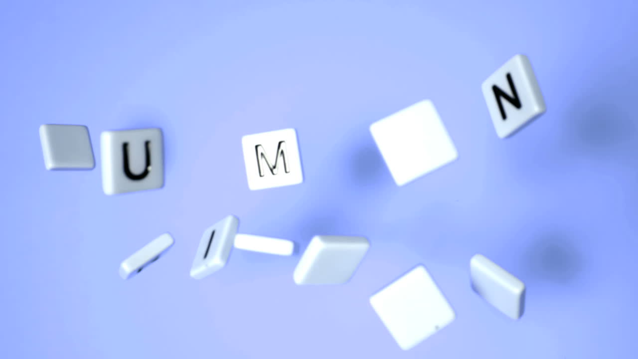 letras de plástico rebotando y escribiendo derechos humanos en superficie azul