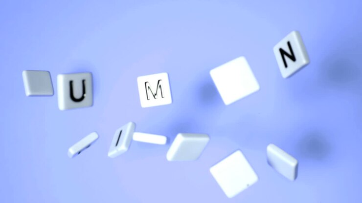 Plastic letters bouncing and spelling human rights on blue surface