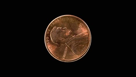 united states 1989 1 cent coin obverse with abraham lincoln portrait rotating on black background