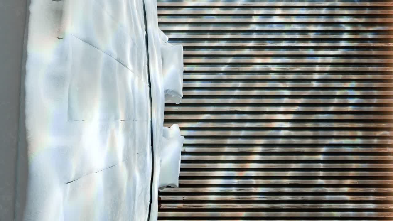 현대적인 평온함: 자연빛으로 여있는 미니멀리즘 침실 수직