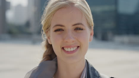 close-up-portrait-beautiful-young-blonde-woman-smiling-enjoying-happy-urban-lifestyle-sunny-day-in-city-cheerful-caucasian-female-enjoys-wind-blowing-hair