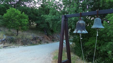 orthodox christian church bells on wood frame greece countryside rural faith religion