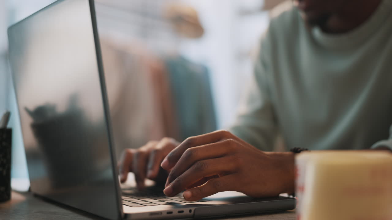 Remote work, laptop and typing