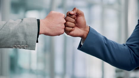 business fist bump collaboration