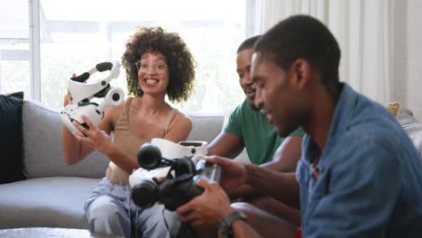 diverse friends enjoying virtual reality headsets together, smiling and having fun indoors