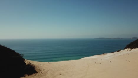 Flying-Towards-Sand-Banks-With-Ocean,-Aerial