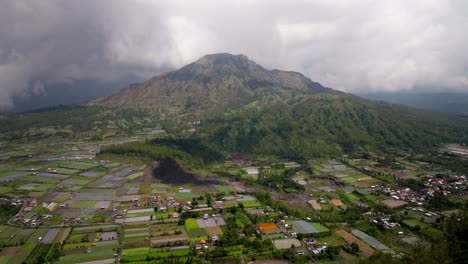 Mount-Batur,-active-volcano,-Kintamani-district,-Bali,-Indonesia,-aerial