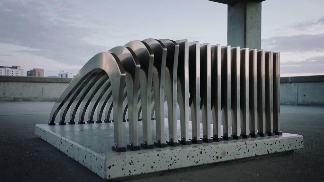 Motor activating, kinetic metal slatted assembly pivoting and curving into arch on rooftop base