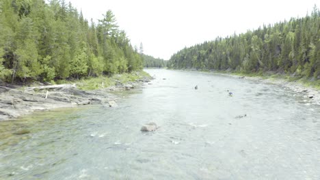 Drone-flying-down-river