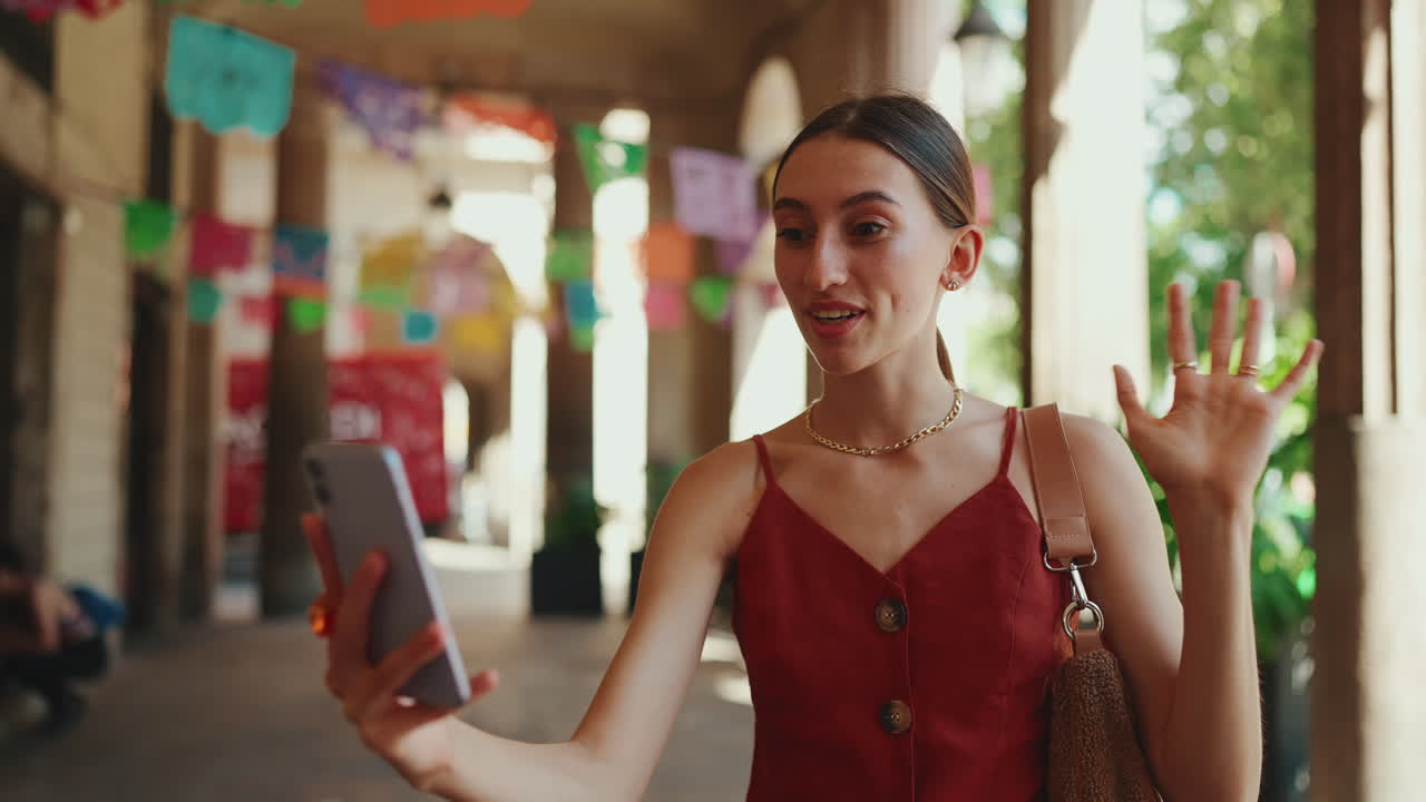 Woman on video call in arcade
